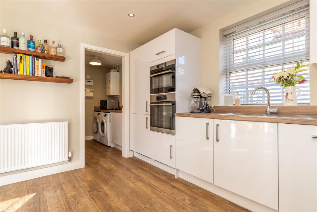 Kitchen through to Utility