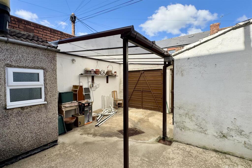 Rear Yard with Carport