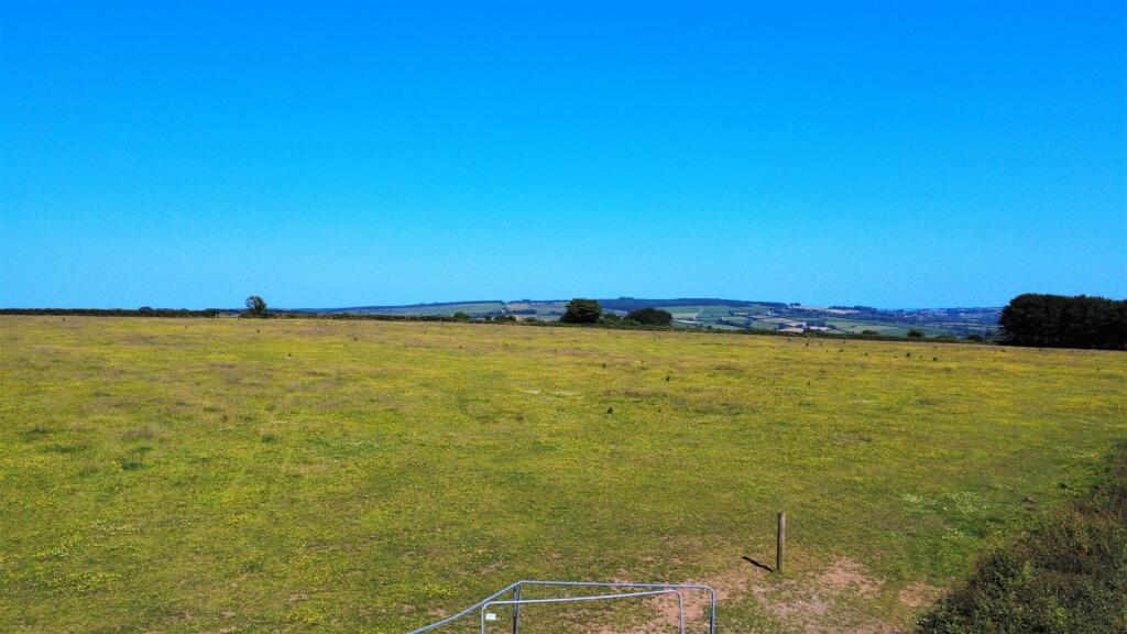dji_fly_20250619_160220_205_1750354246451_photo_op