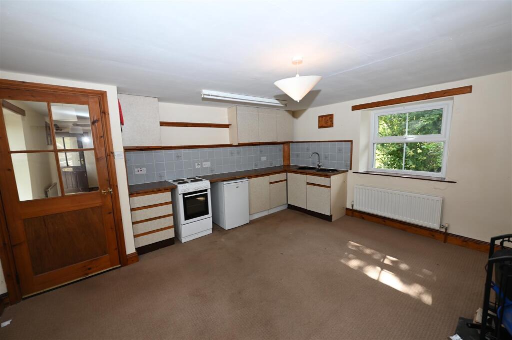SITTING ROOM &amp; KITCHEN