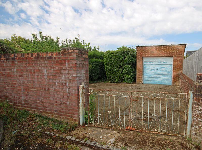 Rear access to parking and garage