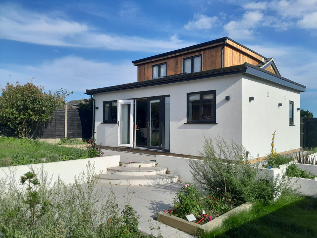 A 4 bedroom semi-detached chalet-style bungalow