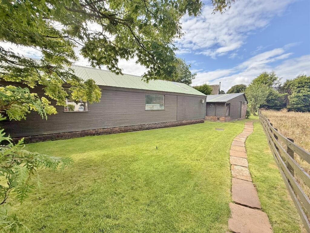 Garage/ workshops and garden