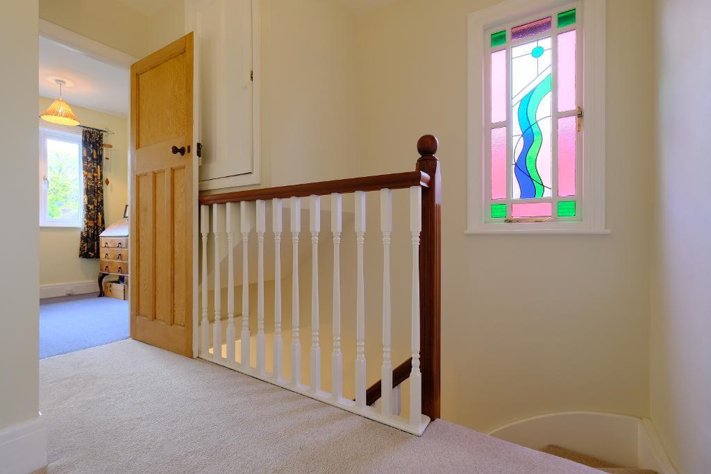 Sun filled landing leading to 3 bedrooms