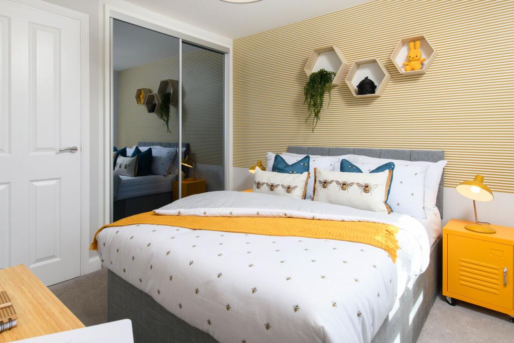 Double bedroom with built-in storage in Millford style home