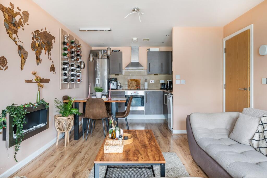 Open plan living space with balcony