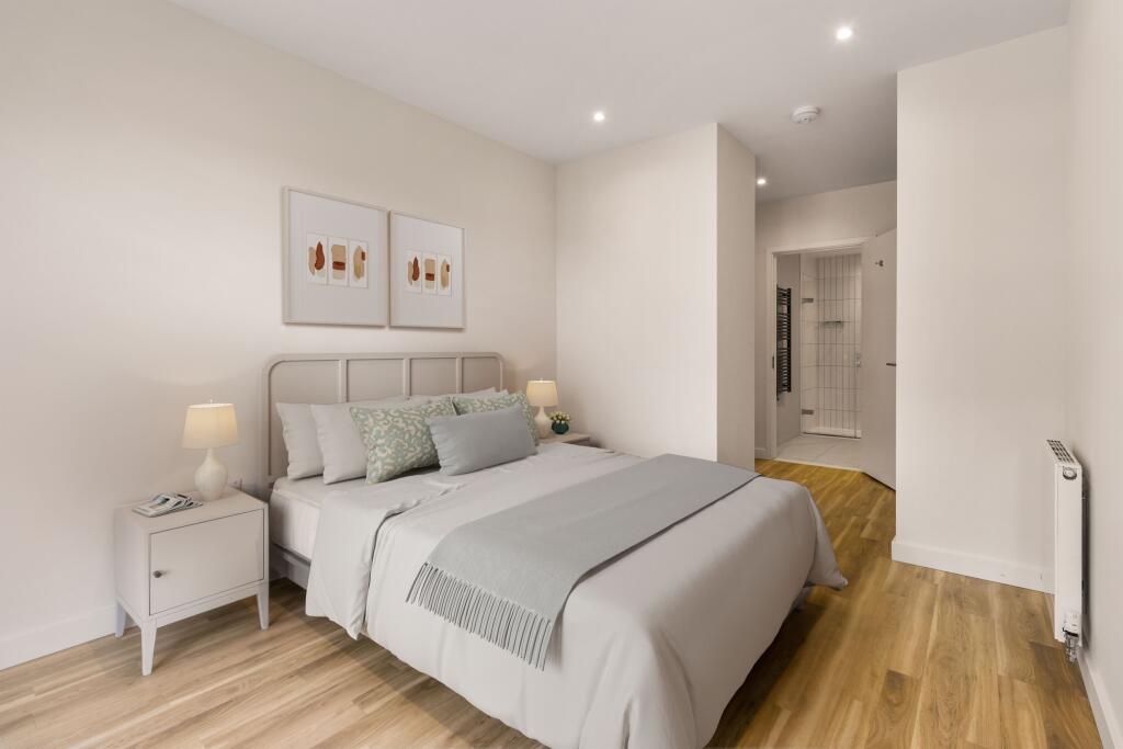 Step into elegance with this beautifully designed bedroom, offering ample space and comfort.