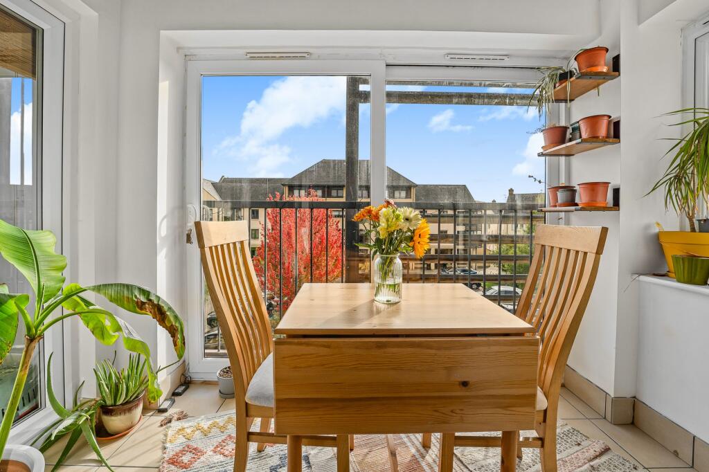 Dining Area &amp; Balcony