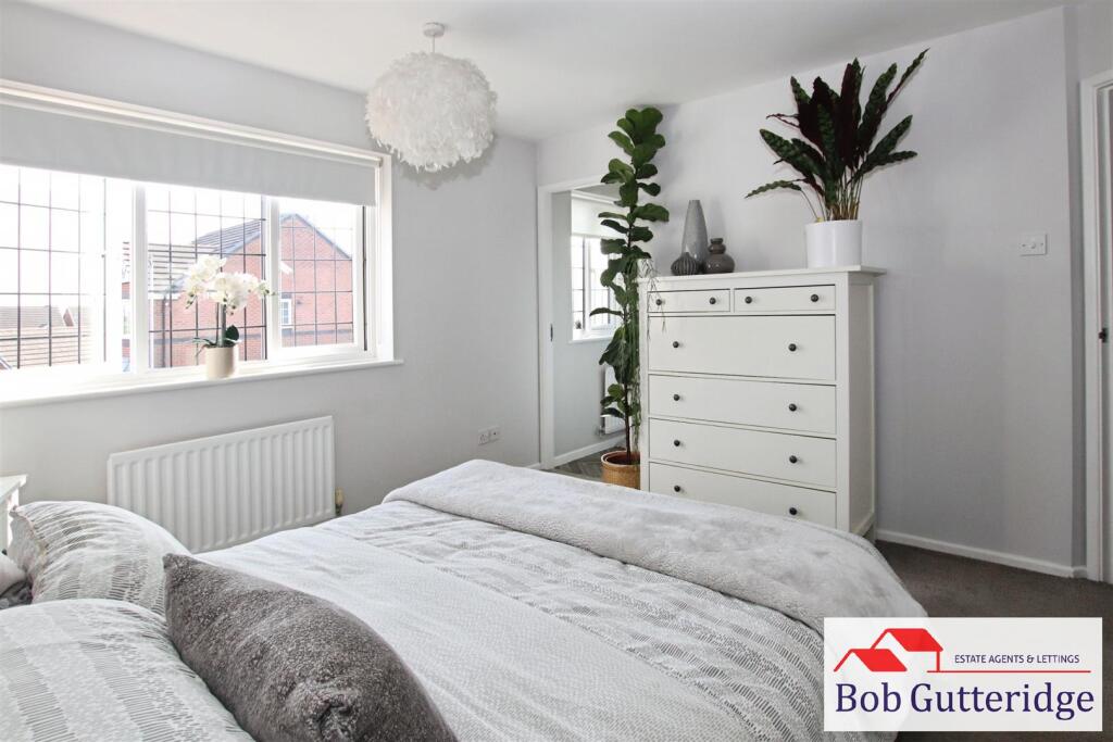 BEDROOM ONE (FRONT)