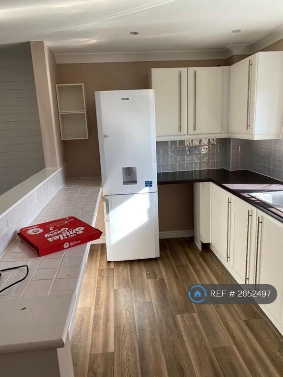 Kitchen Showing Fridge Freezer 