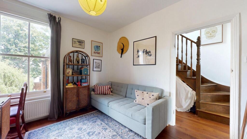 Bright and inviting living room featuring a com...