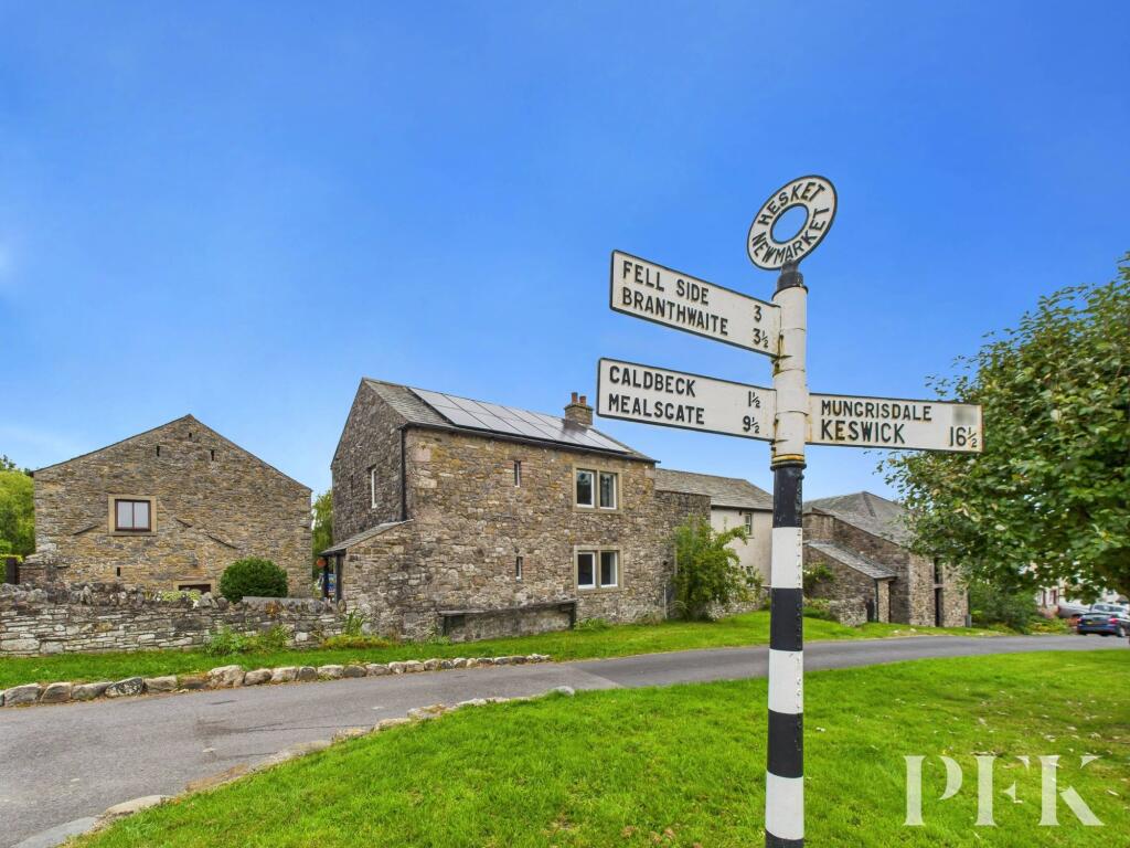 Across village green toward rear of property