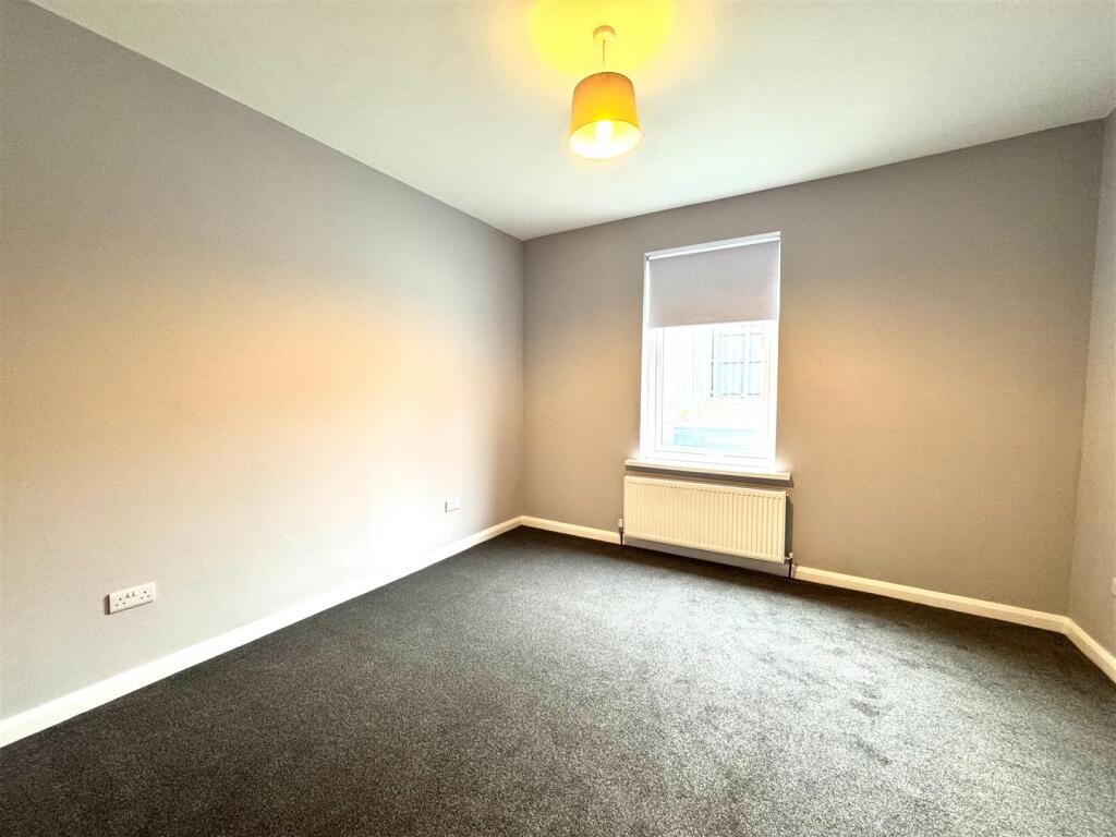 LIVING ROOM/BEDROOM ONE