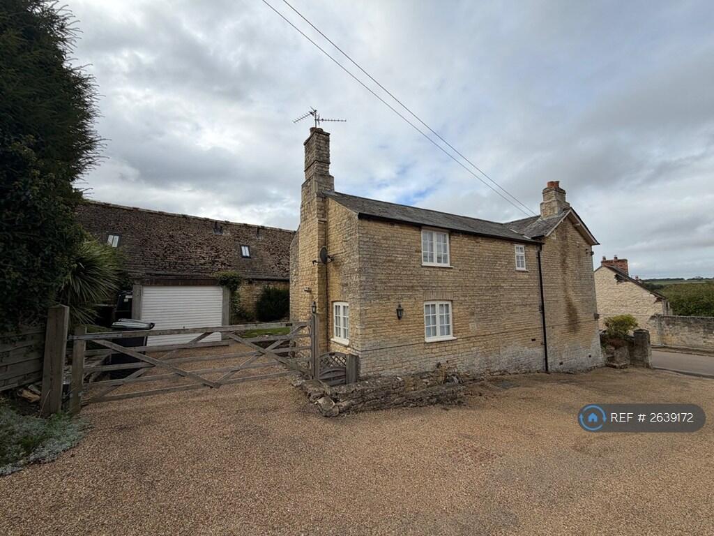 Side View Including Parking And Garage