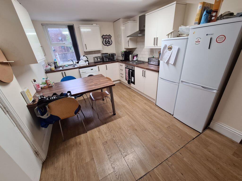 Bright and functional kitchen featuring ample c...