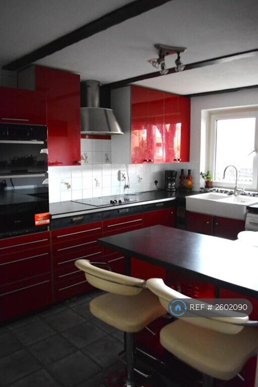 Kitchen With Breakfast Bar And New Appliances