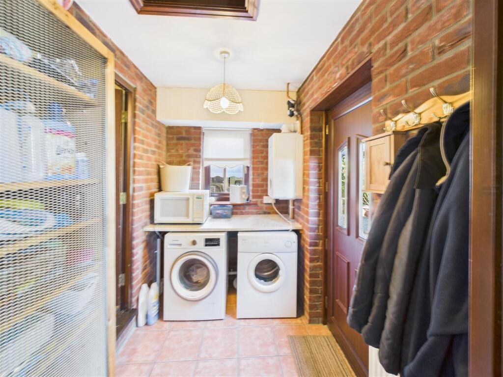 REAR ENTRANCE / UTILITY ROOM