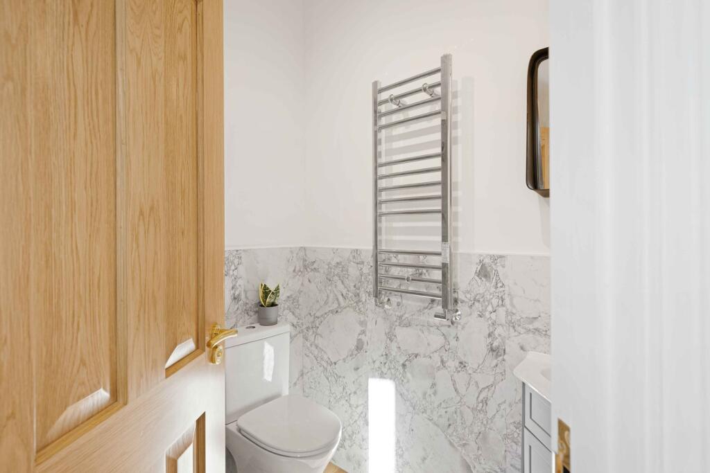A modern and clean bathroom featuring stylish f...
