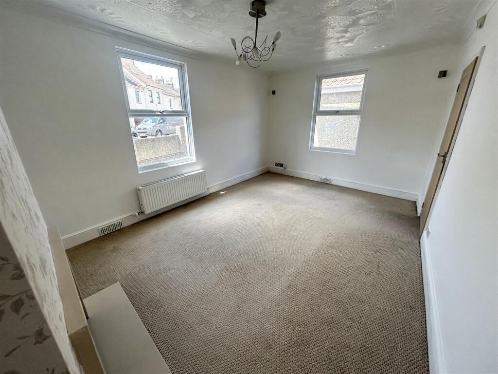 LIVING ROOM/ FOURTH BEDROOM