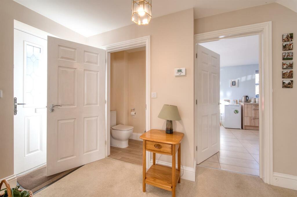 Entrance Hallway - WC and Kitchen Diner.jpg