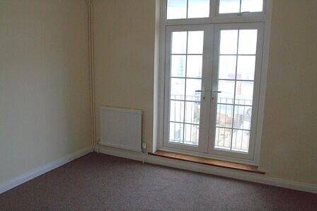 Bedroom with balcony