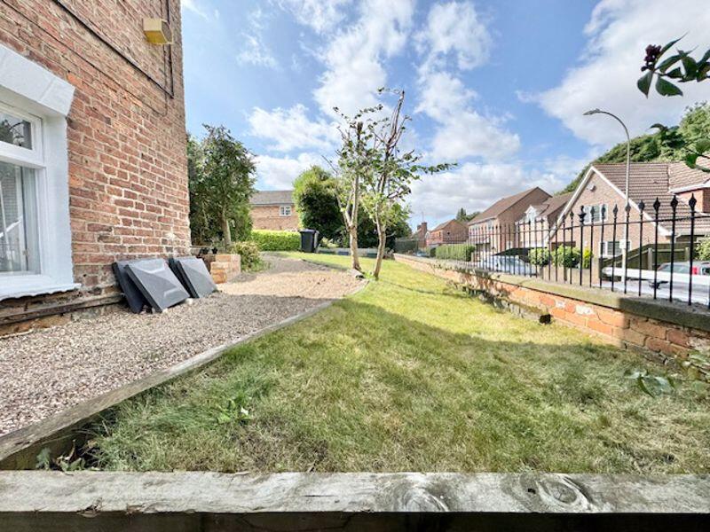 Side garden to rear 