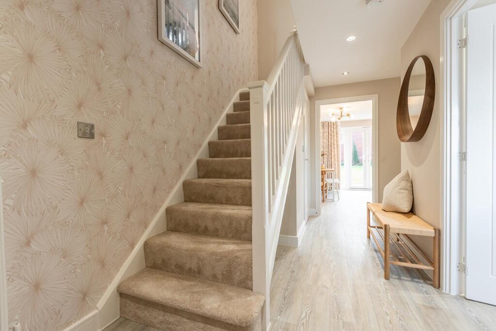 Entrance hallway with under stairs storage