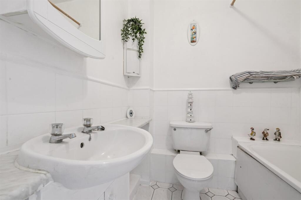 147 Sutton Common Road bathroom 2.jpg