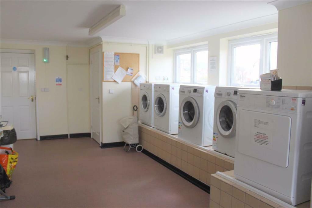 RESIDENTS LAUNDRY AND IRONING ROOM
