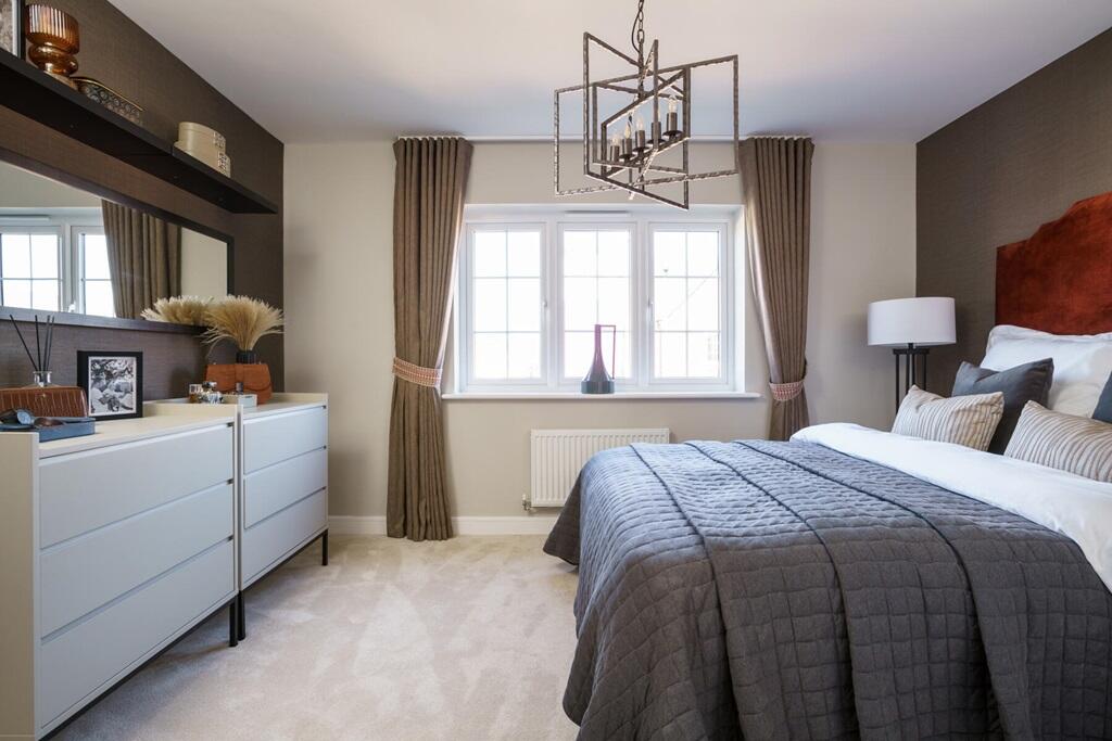 Bedroom 1 sits to the front of the home