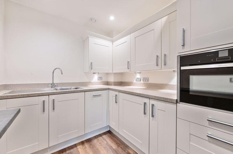 Kitchen with built-in appliances