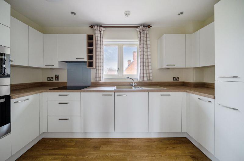 Kitchen with built-in appliances