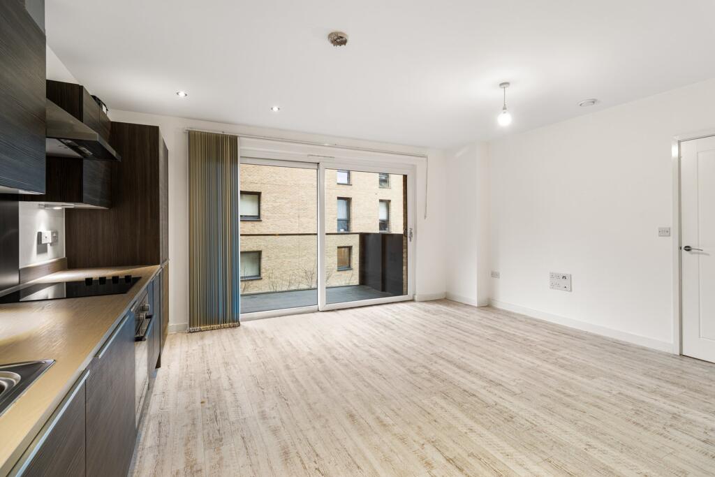 Experience the elegance of this open-plan living space, designed for modern lifestyles.