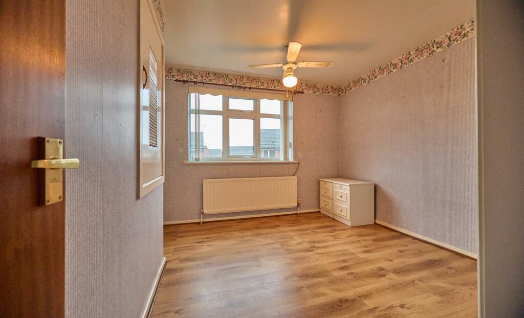 FRONT BEDROOM ONE