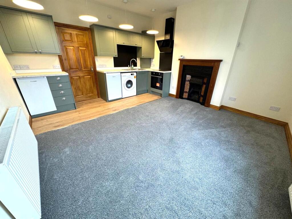 Open Plan Sitting Room/ Kitchen Pic 1