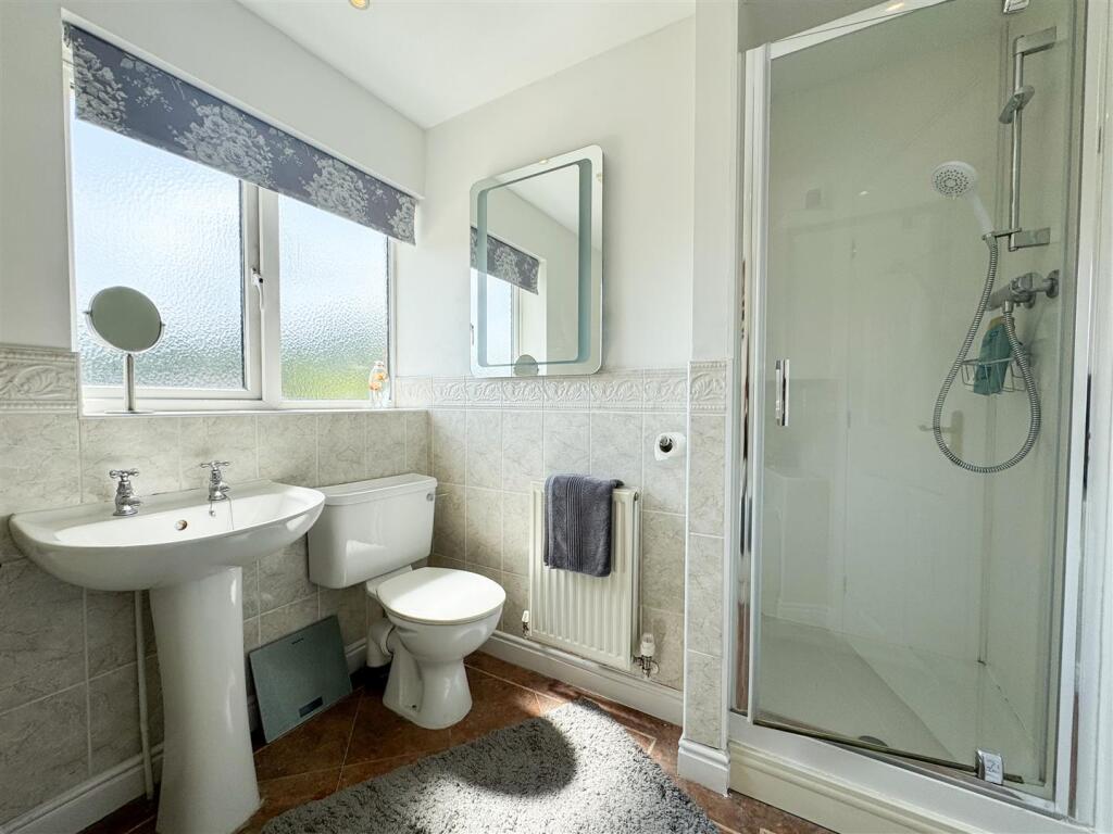 FAMILY BATH AND SHOWER ROOM