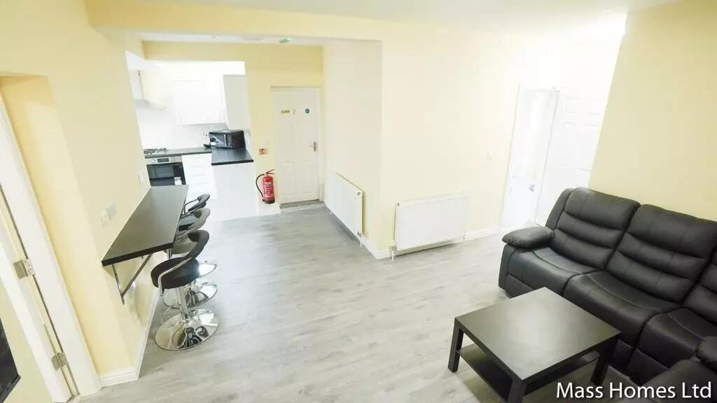 Bright and modern communal living space featuri...