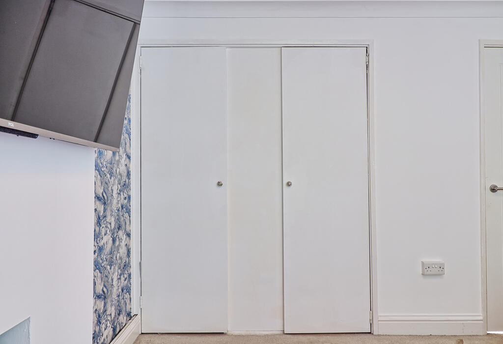 Double Cupboard in Lounge