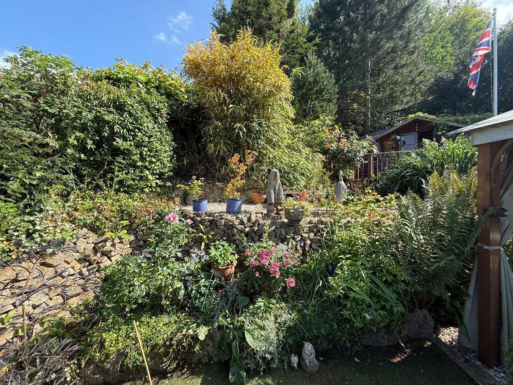 Home office with deck and WC next to it.