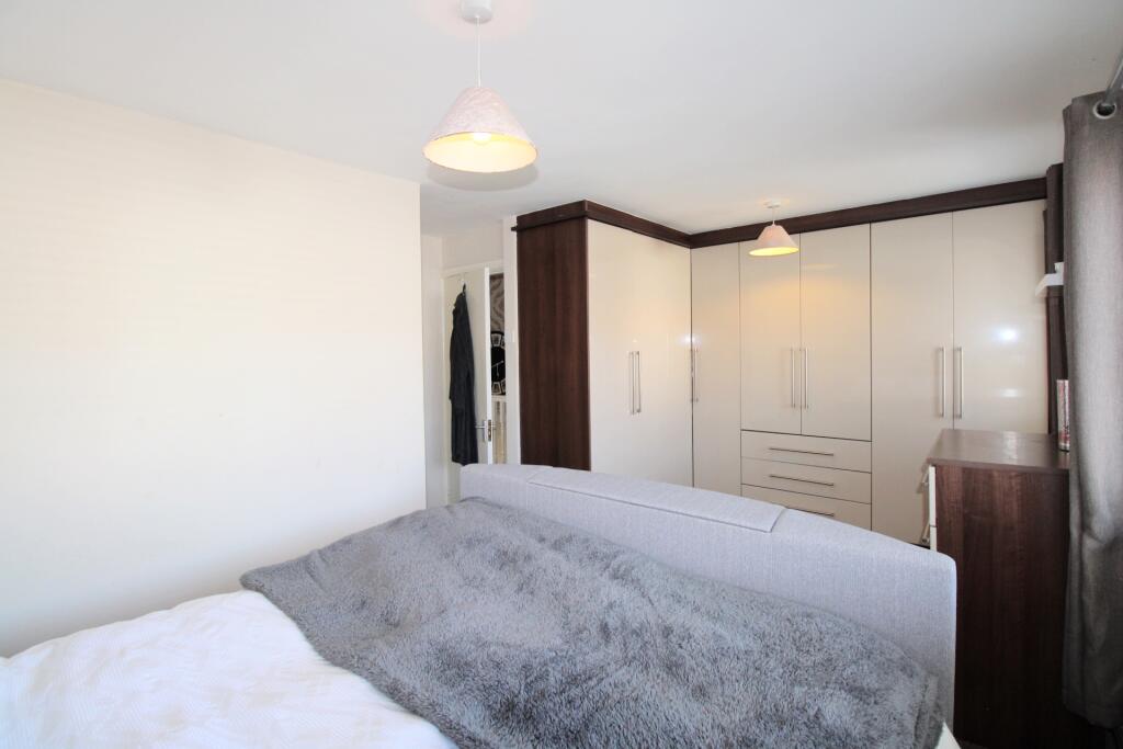 Bedroom one with fitted wardrobes