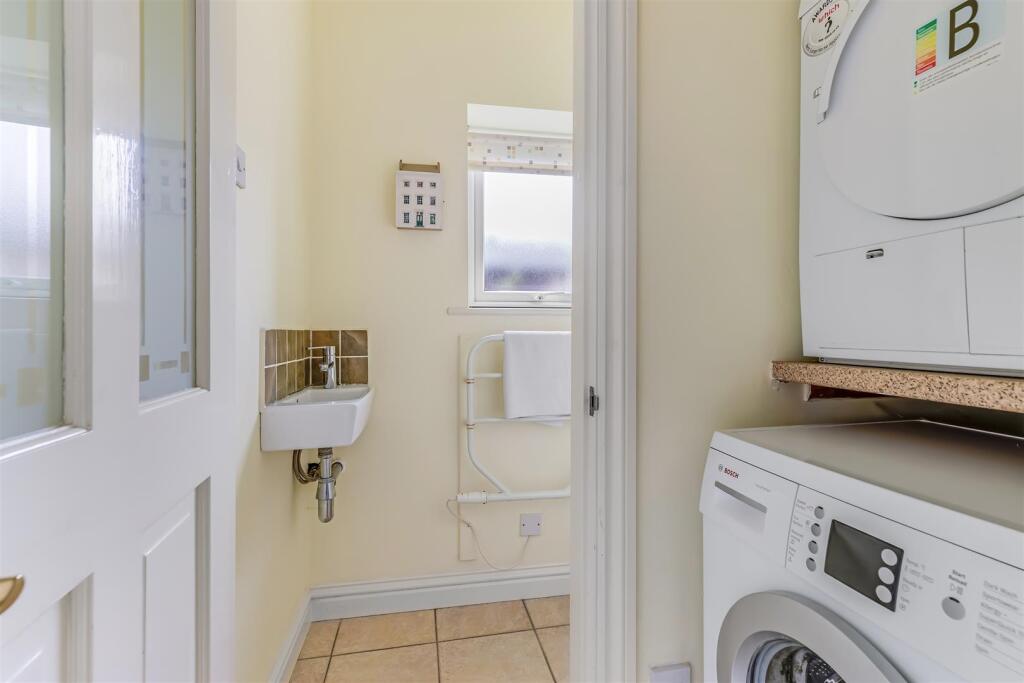 Utility To Downstairs WC