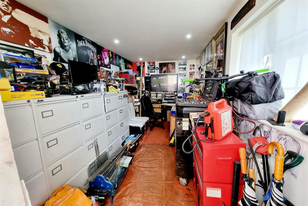GARAGE CONVERSION/HOME OFFICE: