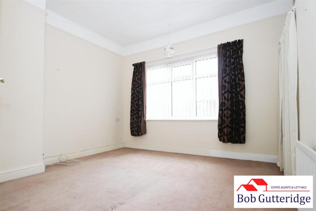 BEDROOM ONE (FRONT)