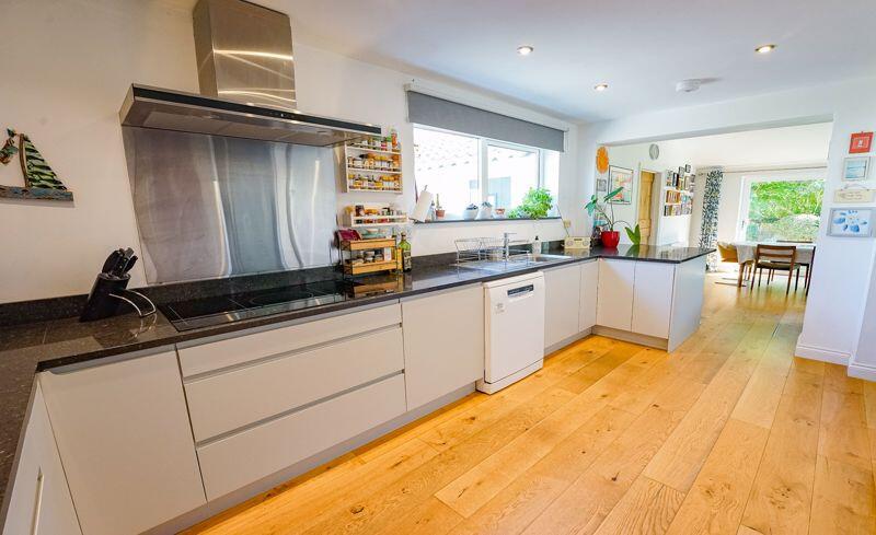 Kitchen leading to the open plan fami...