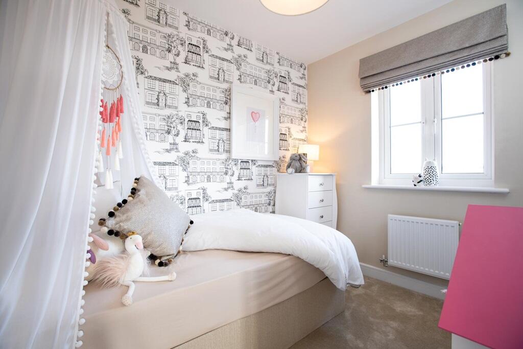 A pop of colour or an exciting wallpaper puts a stamp on the children's bedroom
