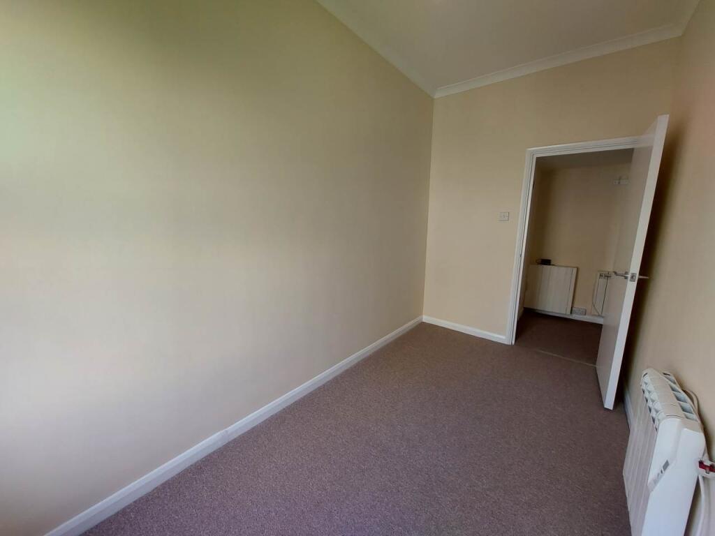 Second bedroom (fron