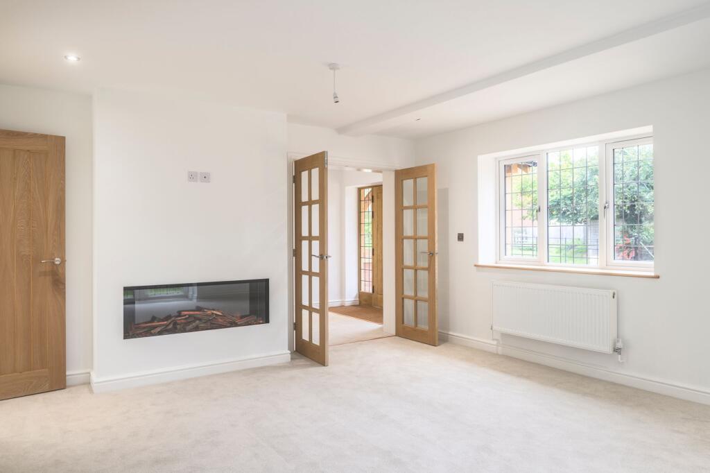 Living room with feature fireplace