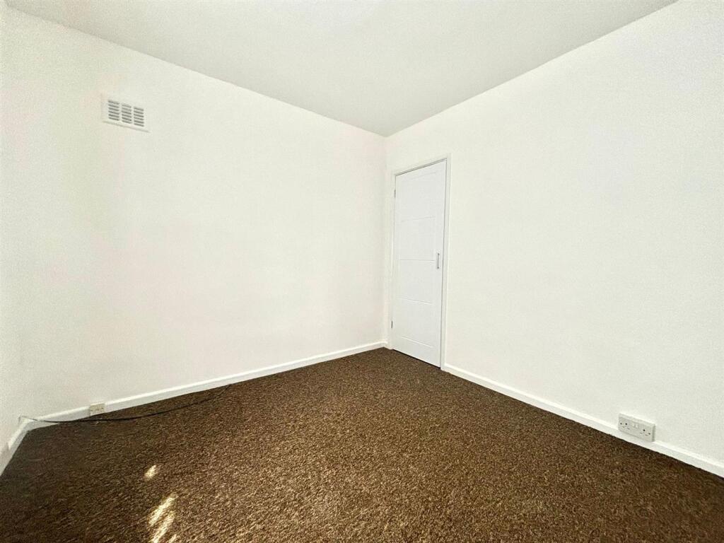 Bedroom 1 shot 2.jpeg