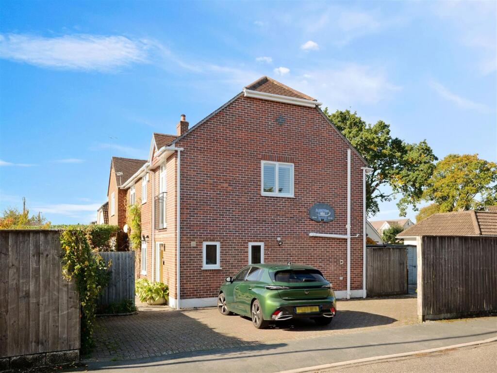 Side of property with parking
