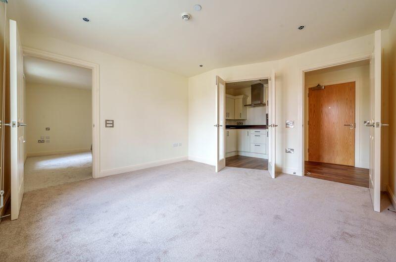 Living/dining room through to kitchen